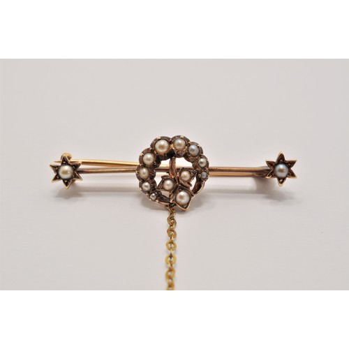 191 - Antique yellow gold pin brooch with seed pearl lily of the valley flower design, stamped 15 CT. Appr... 