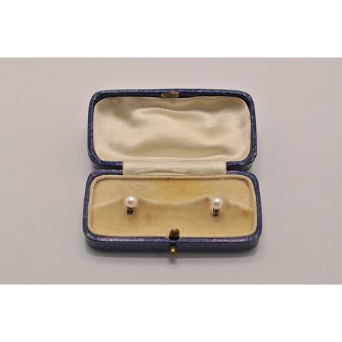 201 - A pair of white gold pearl screw lapel pins, stamped 9ct