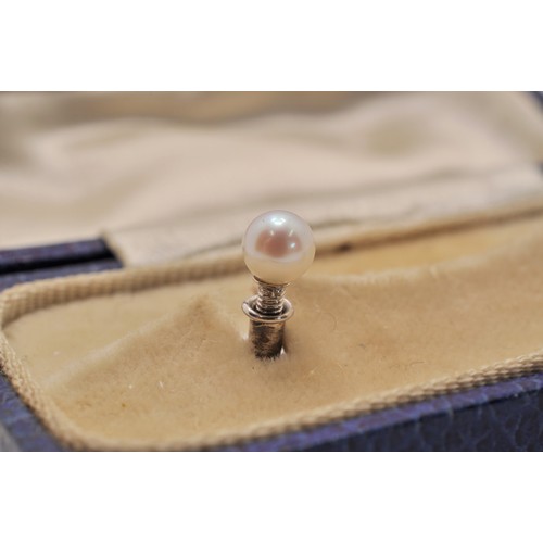 201 - A pair of white gold pearl screw lapel pins, stamped 9ct