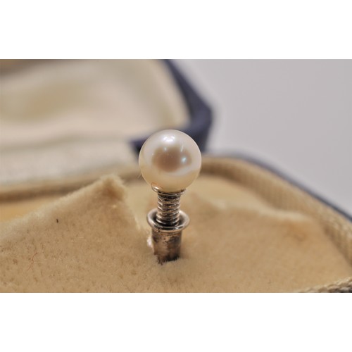 201 - A pair of white gold pearl screw lapel pins, stamped 9ct