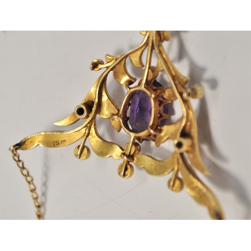 211 - Antique Edwardian pendant with chain, consisting of  amethysts and seed pearls, stamped 15ct gold, a... 