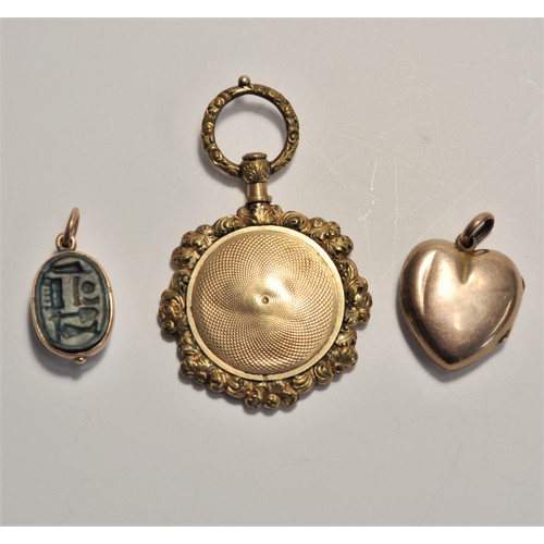 214 - Group of antique jewellery; a yellow metal mourning pendant containing a lock of hair with gold thre... 