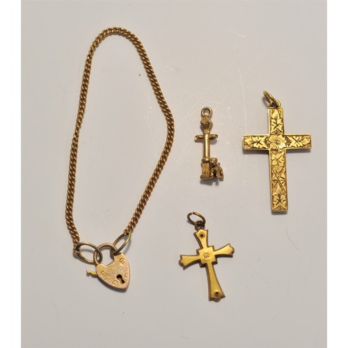 215 - Group of 9ct gold items consisting of necklace, pendants, bracelet and charm, approx. combined gross... 