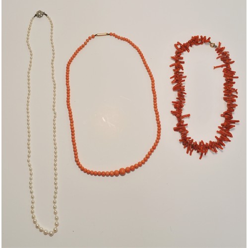 216 - Vintage jewellery consisting of necklaces and earrings. One coral necklace stamped 9ct to clasp