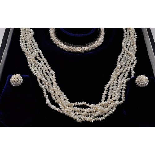 221 - Mangatrai pearl set consisting necklace, bracelet and earrings, in original presentation box