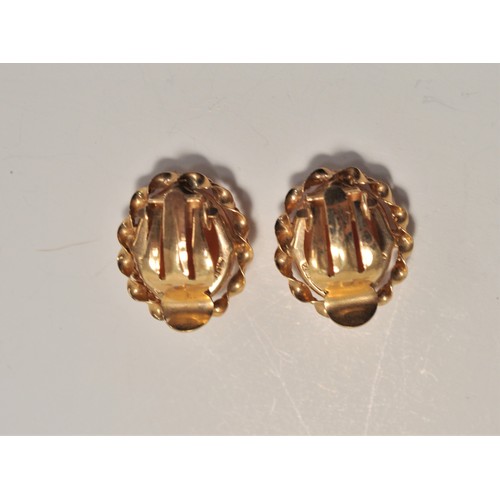 226 - Pair of 9ct yellow gold clip on cameo earrings hallmarked birmingham. approx gross weight 3.4g