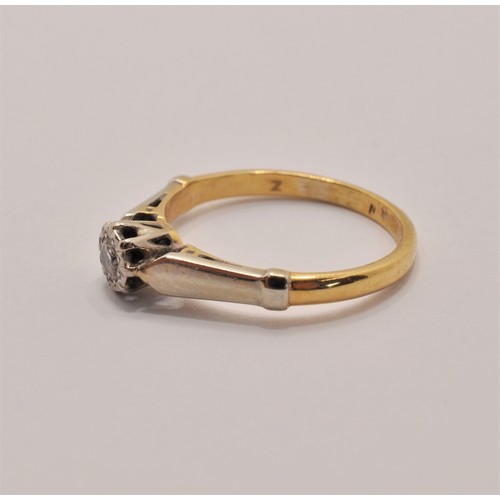 234 - 18ct yellow gold and platinum ring with a round-cut diamond. marked 18ct and plat, approx. size K, a... 