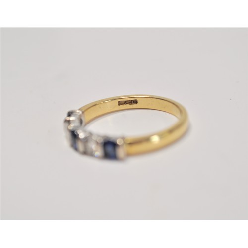 245 - 18ct yellow gold diamond and poss.sapphire eternity ring approx. size L, approx. gross weight 3g