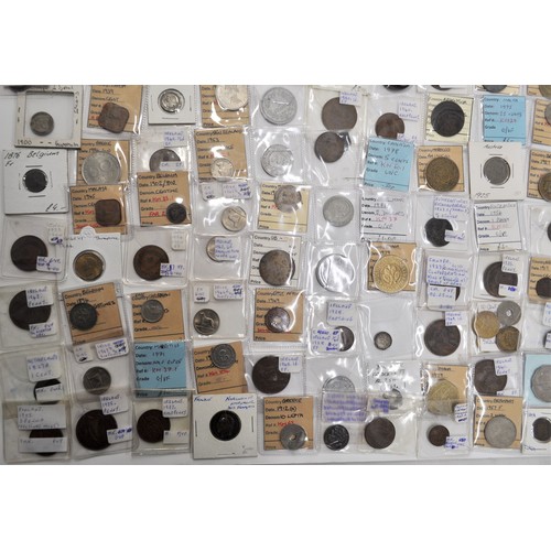 129 - A retired collector's collection of various worldwide coins and tokens from countries such as Britai... 