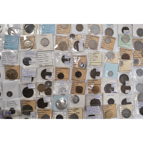 129 - A retired collector's collection of various worldwide coins and tokens from countries such as Britai... 