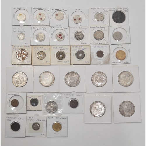 129 - A retired collector's collection of various worldwide coins and tokens from countries such as Britai... 