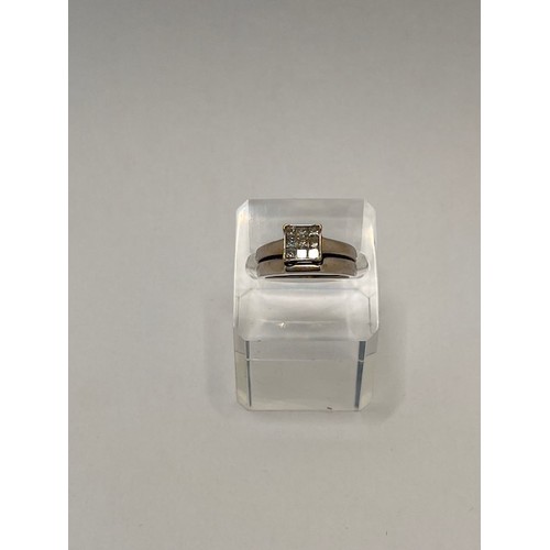 252 - A white gold twin band ring of fixed design (plain band is stamped 10k, the diamond square cut ring ... 