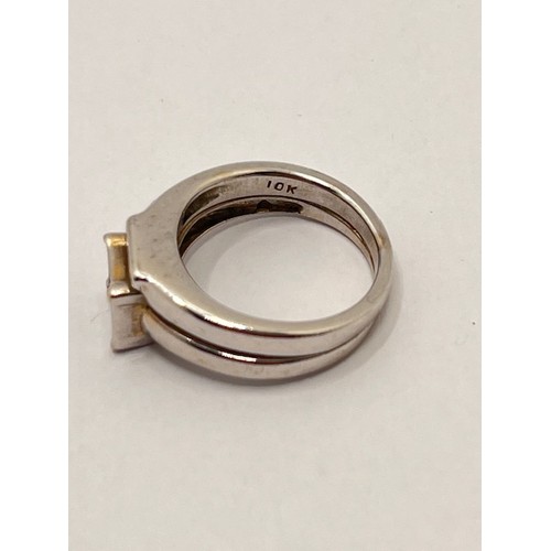 252 - A white gold twin band ring of fixed design (plain band is stamped 10k, the diamond square cut ring ... 