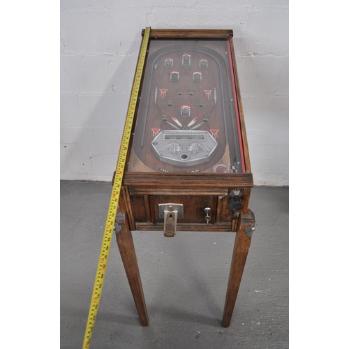 1 - Vintage wooden pinball machine with Indian figural to plaque, legs and fittings and a set of keys ma... 