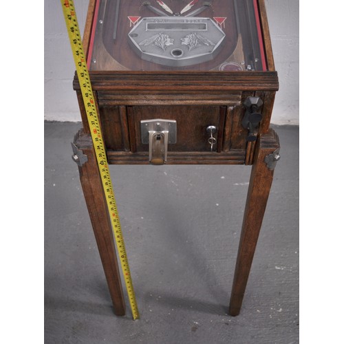 1 - Vintage wooden pinball machine with Indian figural to plaque, legs and fittings and a set of keys ma... 