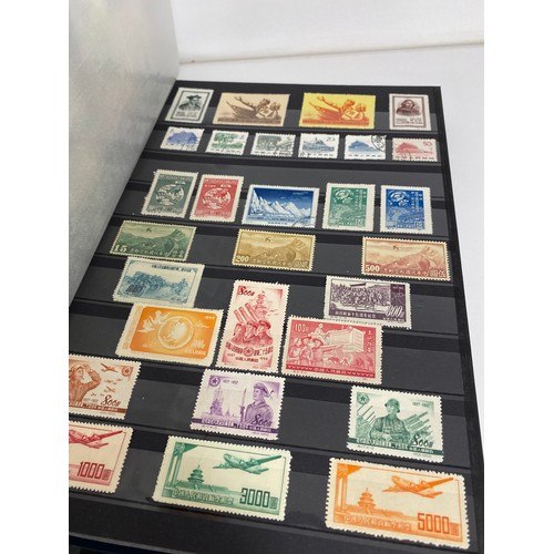 33 - Various Stamp albums containing a mix of UK and stamps from around the world as follows:
x4 UK and B... 