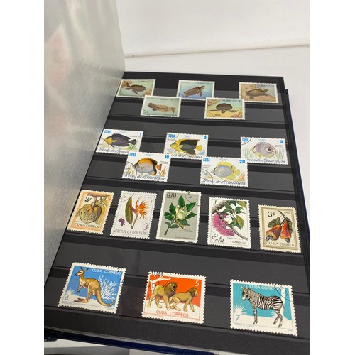 33 - Various Stamp albums containing a mix of UK and stamps from around the world as follows:
x4 UK and B... 