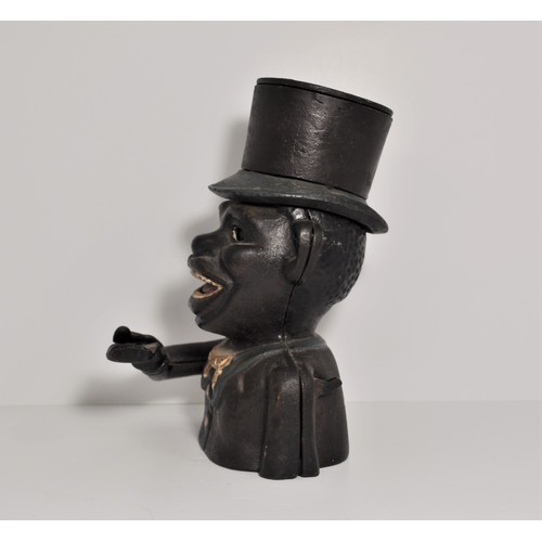 39 - Cast Iron Golly novelty money box