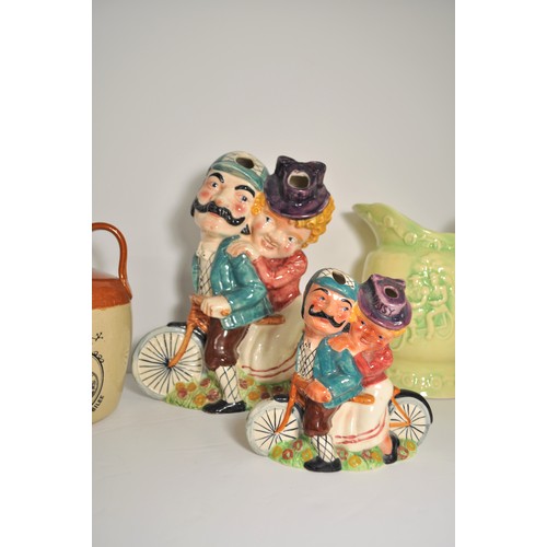 54 - Cycling interest - A collection of ceramics, comprising: Shorter Daisy Bell figures in two sizes the... 