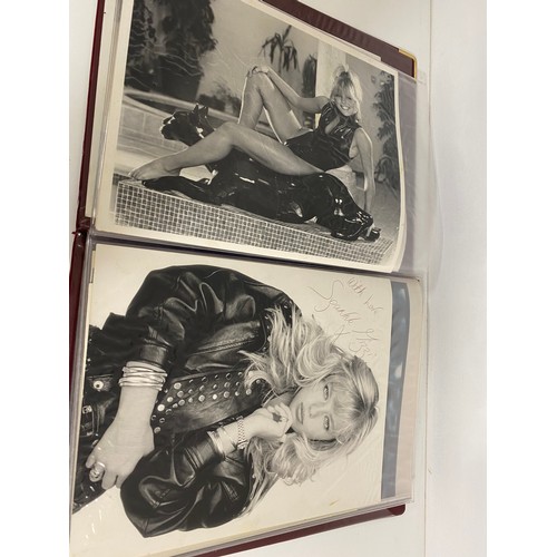 60 - x12 photographs of model Suzanne Mizzi in various poses, five of which have been signed