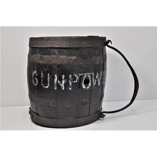 84 - An oak barrel painted black with 