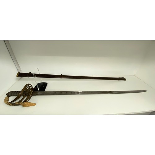 88 - Henry Wilkinson Pall Mall London, British officer's sword  in scabbard stamped 31185 to spine. VR cy... 