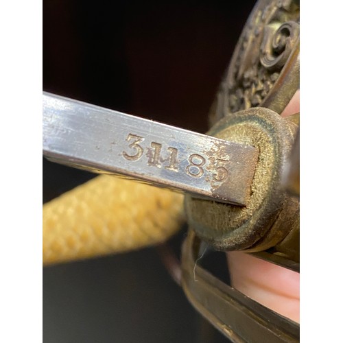 88 - Henry Wilkinson Pall Mall London, British officer's sword  in scabbard stamped 31185 to spine. VR cy... 