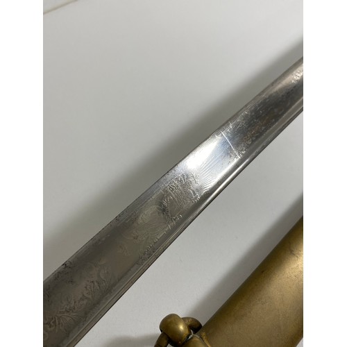 89 - Victorian reign British sword with brass hilt featuring VR cypher, slight curve to blade with  decor... 