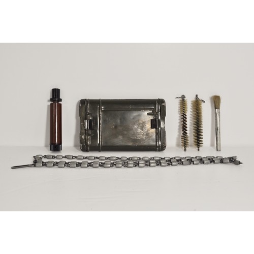 98 - Military German gun cleaning kit includes 2 barrel brushes, a metal chain, a cleaning brush and an o... 