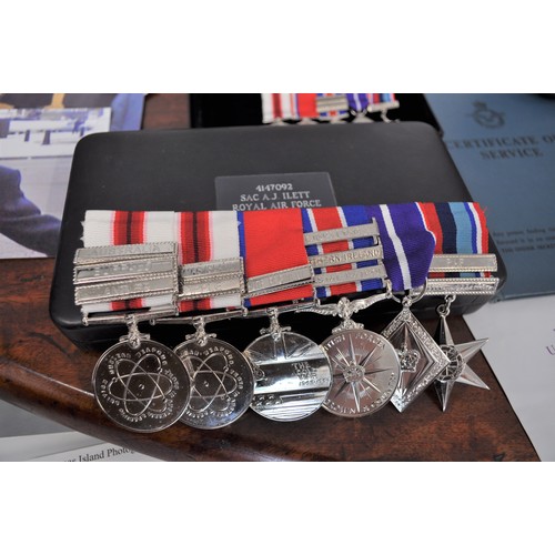 104 - RARE - Medals, possessions and personal documents pertaining to SAC A J Ilett, RAF. 
Items include; ... 