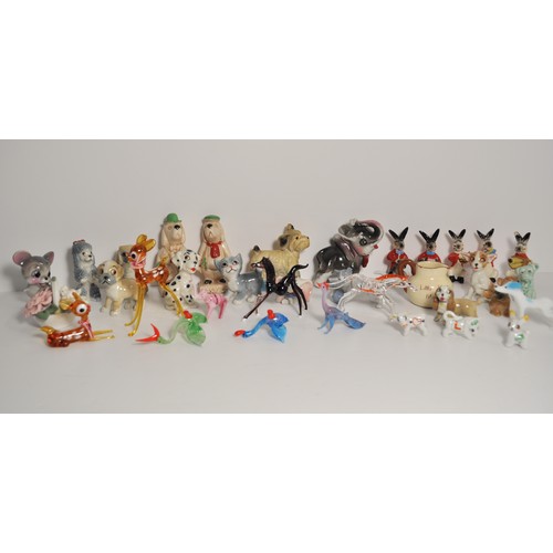 21 - Bunny band instrument performers, various whimsies, pair of bloodhounds together with a quantity of ... 