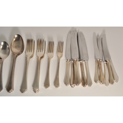 43 - Mappin and Webb Princes Plate 6 person setting, including knifes, forks, spoons and serving spoons.