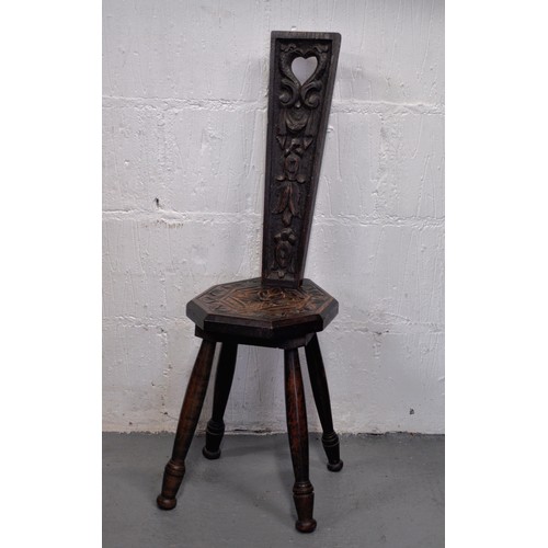 79 - Antique spinning chair with hand-carved design to back panel, approx H86cm