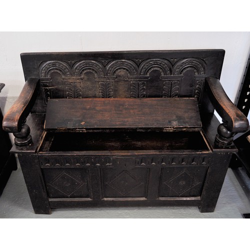 83 - 17th/18th century hand-carved oak monk's bench / settle with inner candle box, approx H84cm x L111cm... 