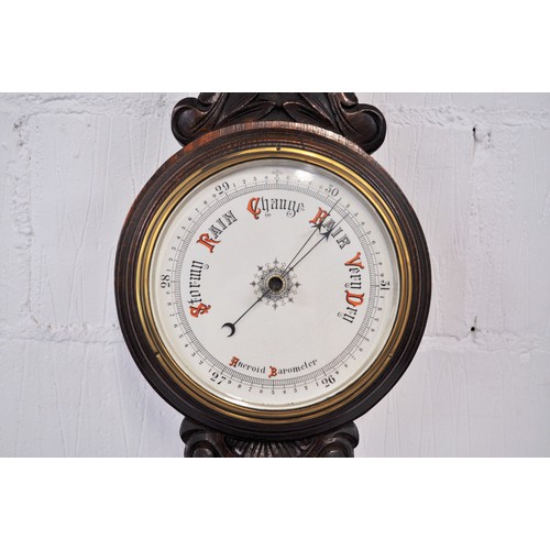 87 - Antique aneroid Barometer with hand carved flower design to stem approx. length 90cm