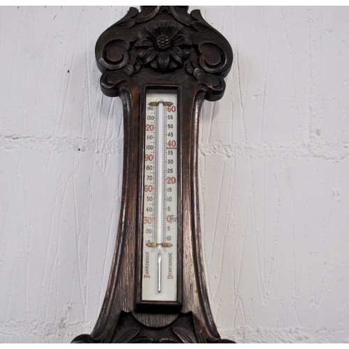 87 - Antique aneroid Barometer with hand carved flower design to stem approx. length 90cm