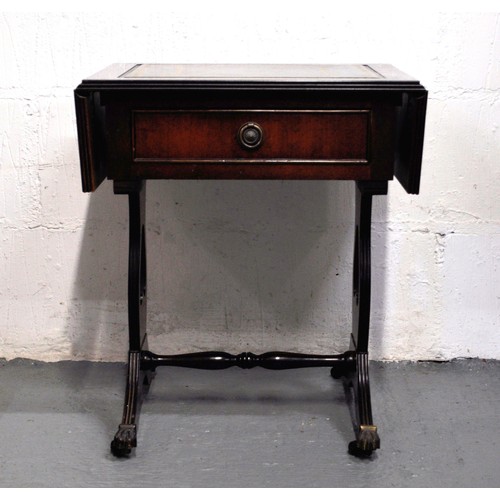 100 - Mahogany side table/drop leaf table with leather top insert, single drawer to front on wheels with l... 