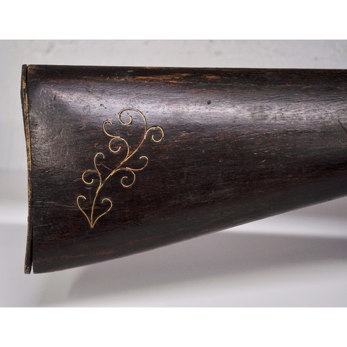 134 - Antique flintlock musket, walnut stock, with white/brass  metal decoration and brass banding, possib... 