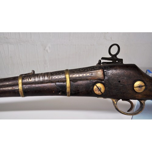 134 - Antique flintlock musket, walnut stock, with white/brass  metal decoration and brass banding, possib... 