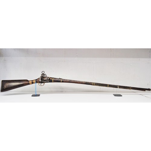 134 - Antique flintlock musket, walnut stock, with white/brass  metal decoration and brass banding, possib... 