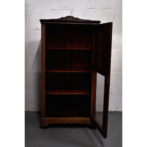 102 - Edwardian inlaid rosewood castored cupboard/music cabinet with marquetry decoration, lower half glaz... 