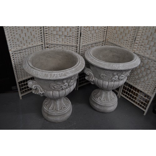 120 - Pair of reconstituted stone garden urns, (comes in two parts) approx height 67cm