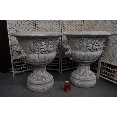 120 - Pair of reconstituted stone garden urns, (comes in two parts) approx height 67cm