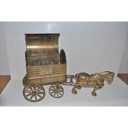 39 - Brass horse drawn brass model gypsy/romany caravan together with brass cannon AF