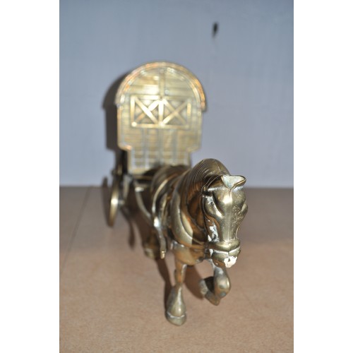 39 - Brass horse drawn brass model gypsy/romany caravan together with brass cannon AF