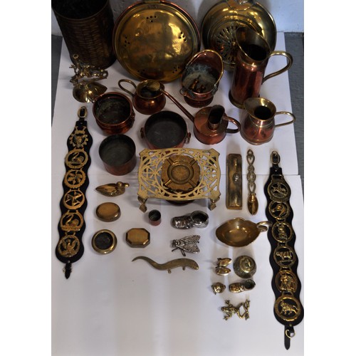 42 - A Mixed collection of copper and brassware items to include; jugs, bowls, watering can, mini coal sc... 