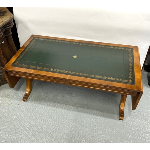 117 - Bevan Funnell Lounge table with green leather inserts, drop leaf to both ends