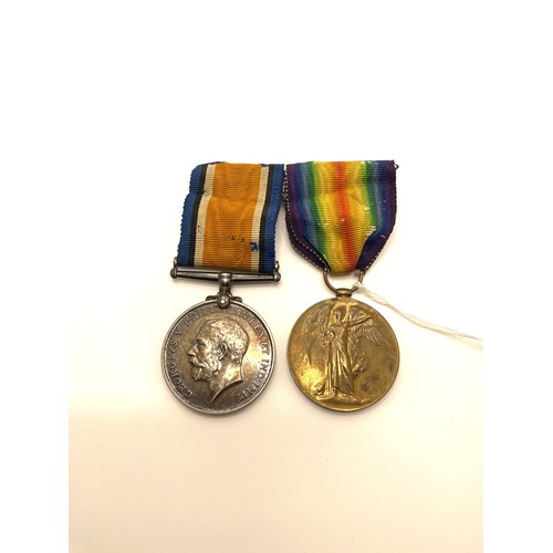 131A - Pair of WWI medals, attributed to M2-133979 PTE.T.W.QUINNELL. A.S.C