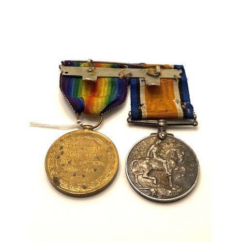 131A - Pair of WWI medals, attributed to M2-133979 PTE.T.W.QUINNELL. A.S.C