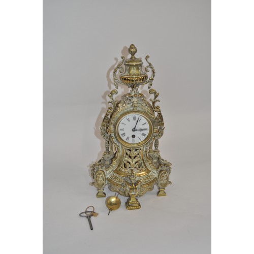 59 - Brass mantle clock of typically French design with white dial, pendulum and key, approx H48cm, untes... 